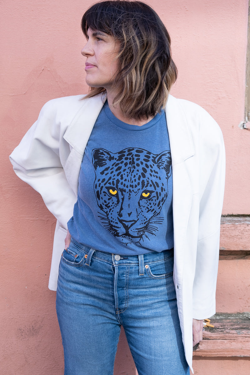 the "snow leopard" graphic tee on blue