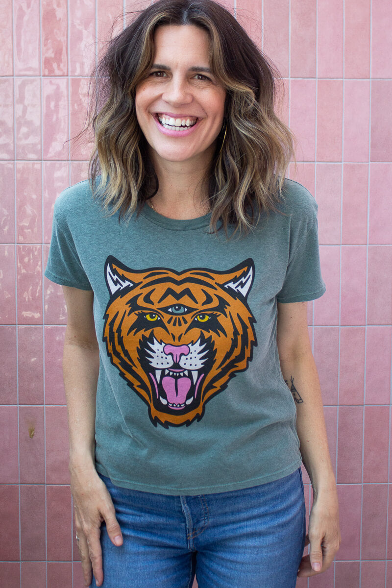 the "cosmic tiger" graphic tee on vintage green