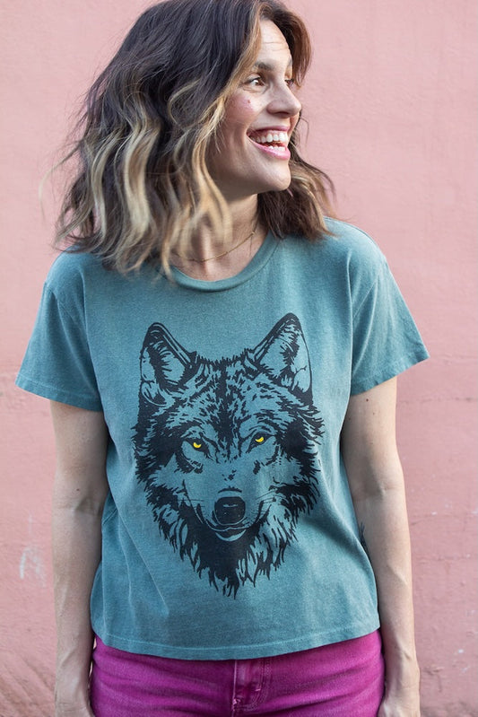 the "mother wolf" graphic tee on vintage green